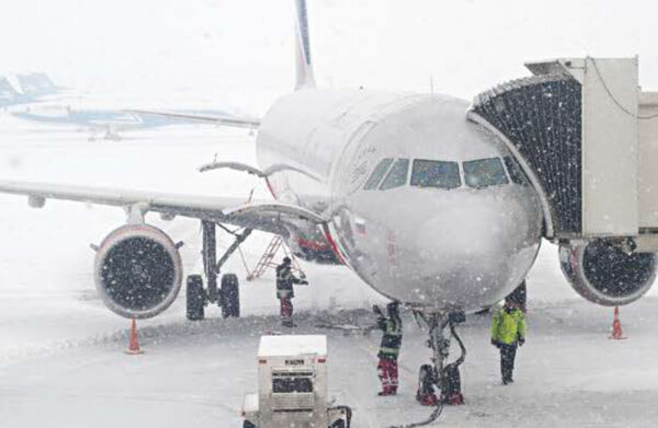 Plane on the ground in the snow